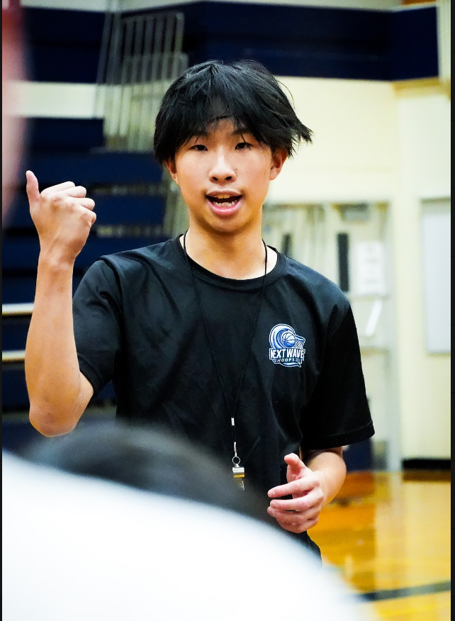 Volunteer coach giving feedback
